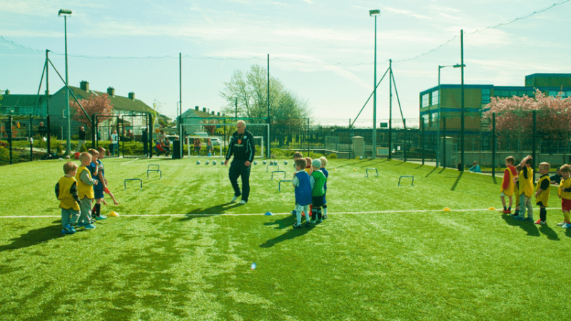 What does a football coach look for in an artificial grass pitch?